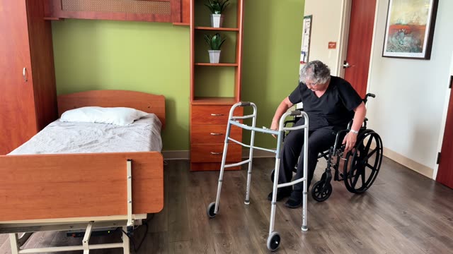 Walker to bed: pull to stand